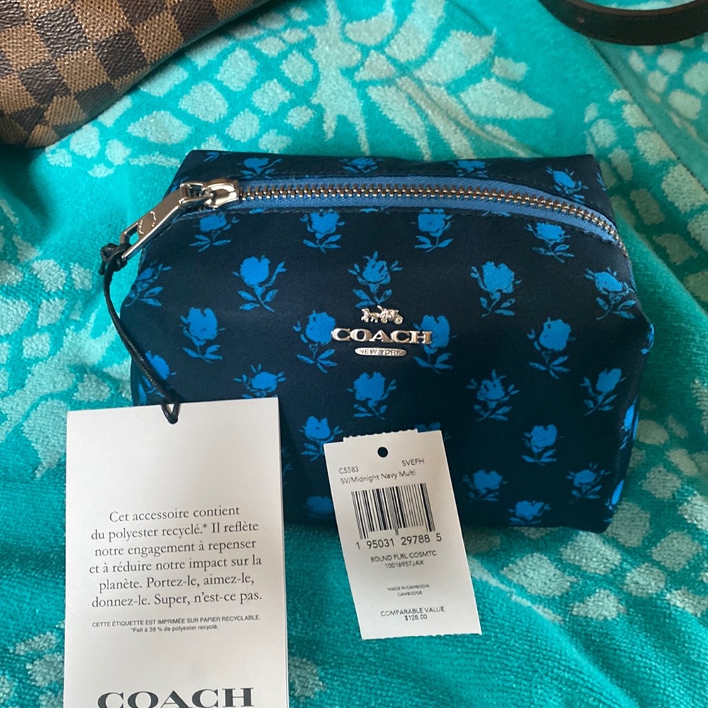 Coach blue cosmetic bag.
